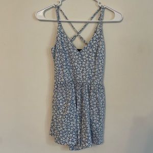 I am selling this Urban Outfitters Blue and White flowered romper.